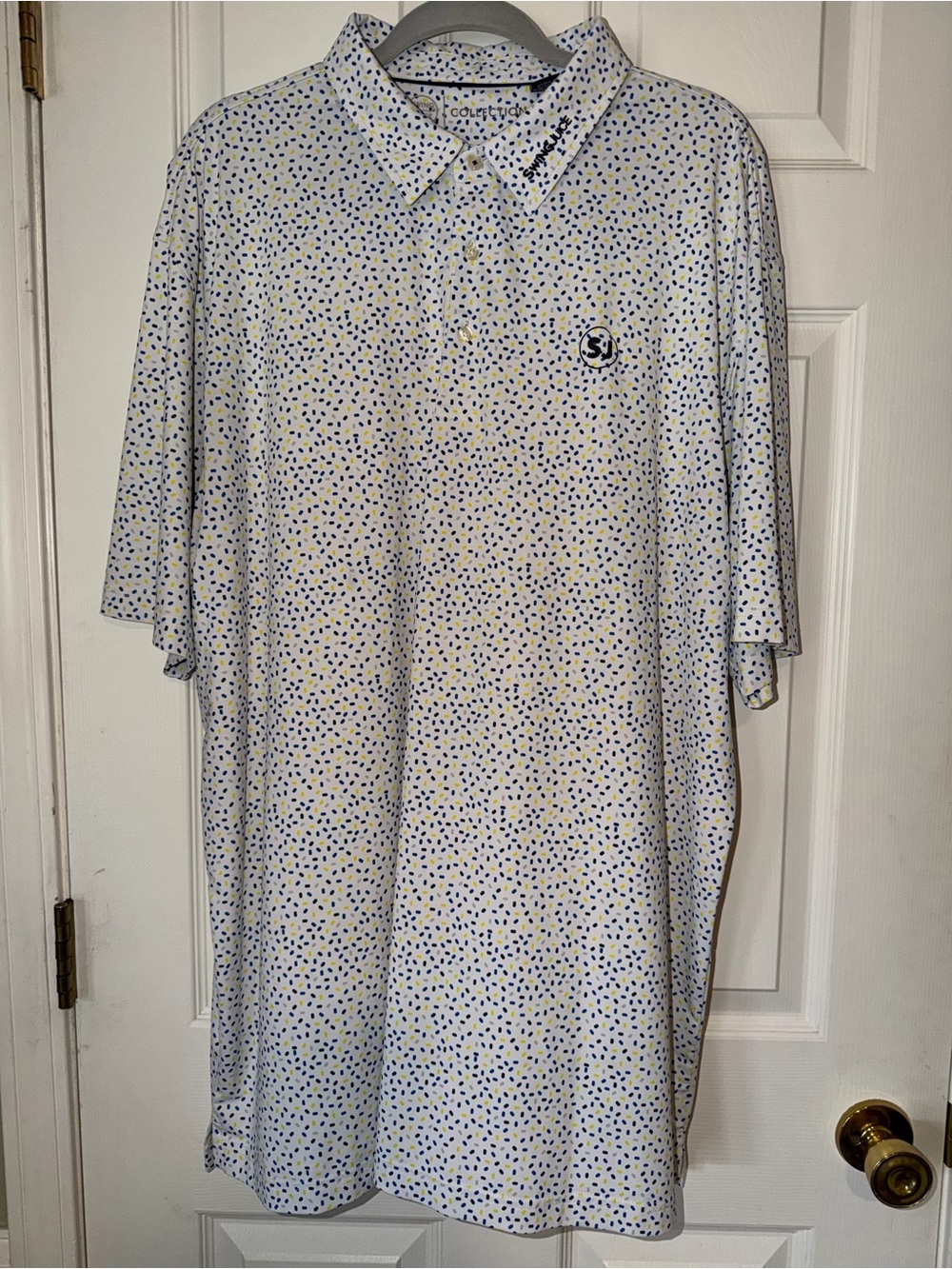 Swingjuice Men's White Golf Polo with Blue and Yellow Dot Pattern and Logo